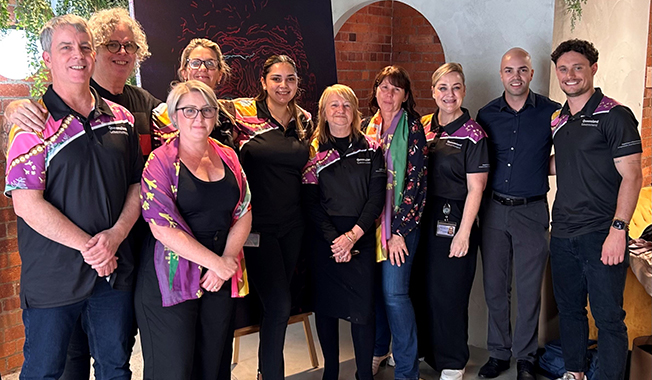 DSDIP staff posing at Birrunga Gallery in Brisbane.